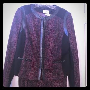 Beautiful 3 piece suit with leather detail.